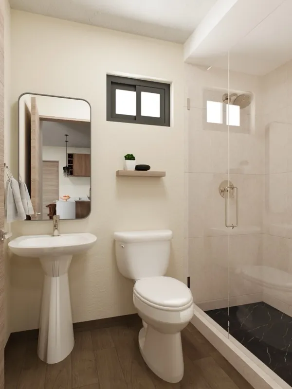 Baño completo con regadera de cristal, lavabo de pedestal y acabados claros